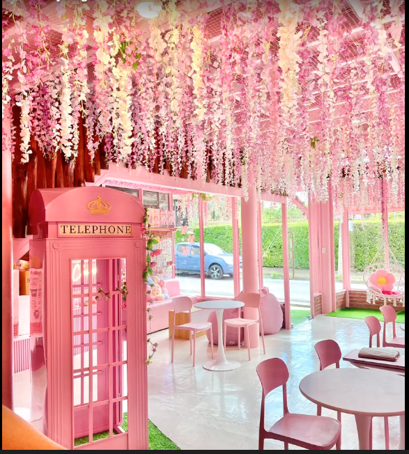 ChaBell interior with pink telephone box and hanging wisteria